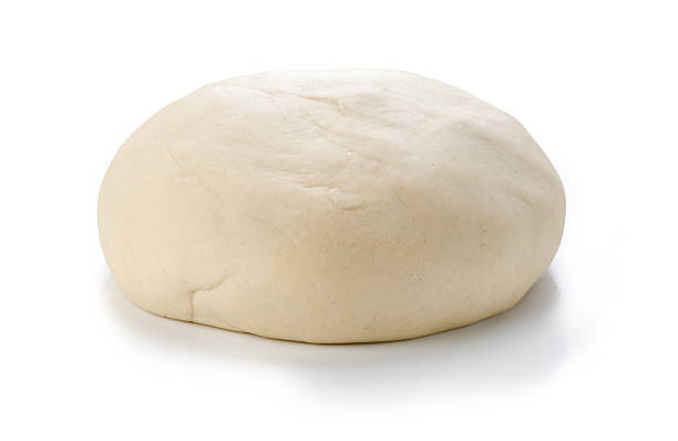 istock Ball of raw dough isolated on white background 626290300