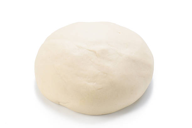 istock Ball of raw dough isolated on white background. Top view. 626290360