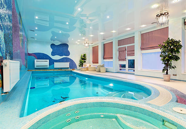 istock Swimming pool interior design with blue mosaic 626290846