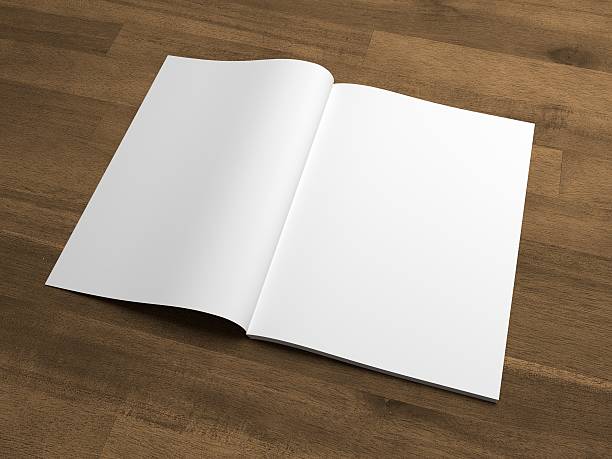 istock Blank 3D illustration opened magazine on wooden desk. 626292444