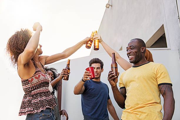 Group of friends partying on balcony
