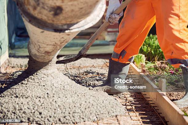 Concrete Pouring During Commercial Concreting Floors Of Building Stock Photo - Download Image Now