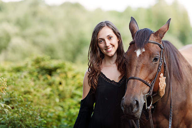istock Woman with her horse 626304678