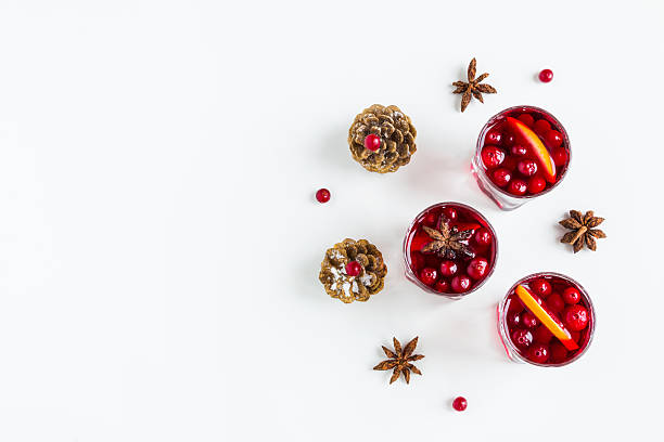 istock Mulled wine in small glasses with cranberries, anise and oranges. 626310454