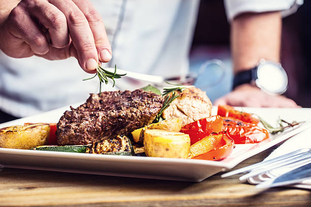 istock Chef in hotel or restaurant kitchen cooking only hands. 626311516