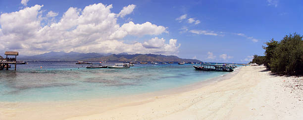istock Gili Trawangan white sandy beaches and blue sky Panorama 626321446