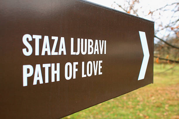 istock sign in autumn for love walk in the forest 626321852