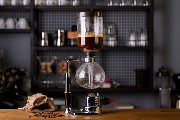 Japanese Siphon Coffee Maker with Halogen Beam Heater stock photo