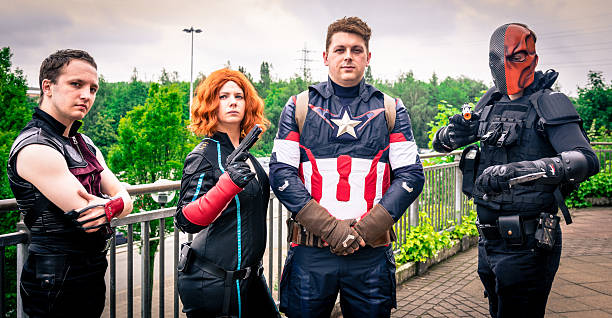 Cosplay as Marvel and DC Comics characters Sheffield, United Kingdom - June 12, 2016: Cosplayers dressed as characters from Marvel and DC Comics at the Yorkshire Cosplay Convention at Sheffield Arena cosplay photos stock pictures, royalty-free photos & images