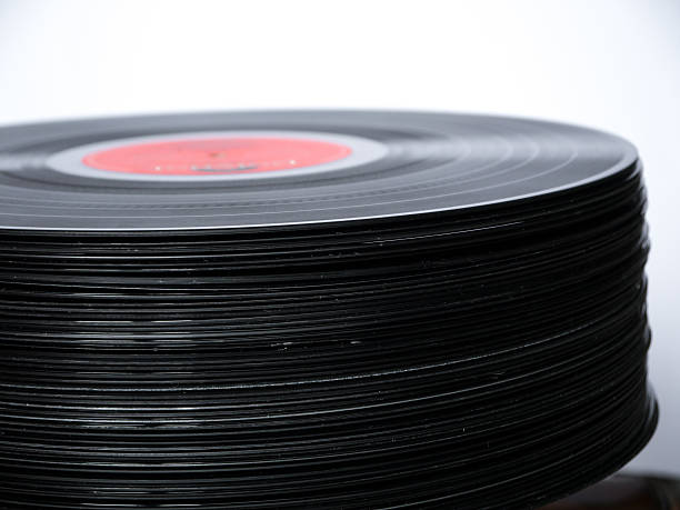 istock Old Stacked Vinyl Records with white background 626330794