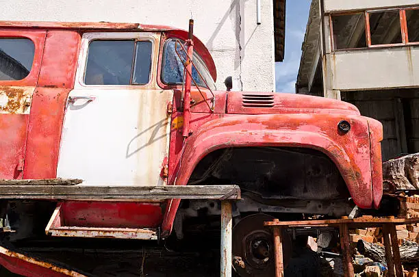 Old dilapidated truck in the back yard