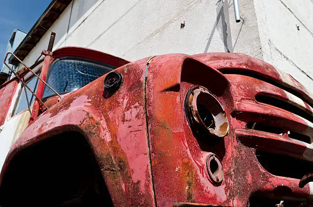 Old dilapidated truck in the back yard