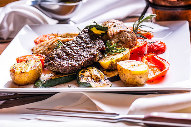 istock Beef Steak. Sirloin steak. Delicious juicy beef steak on fork. 626333036