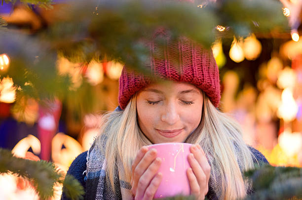 istock Friendly young woman enjoying a hot beverage 626338816