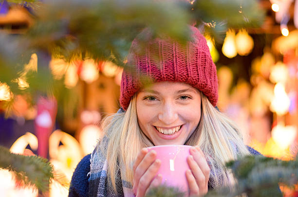 istock Friendly young woman enjoying a hot beverage 626339050