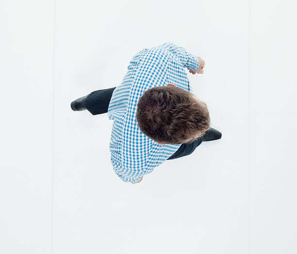 istock Above view of businessman walking 626339452