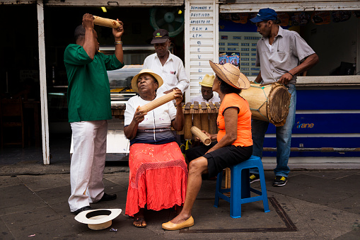Cali, Colimbia - February 6, 2014: Street musicians playing in a street in the city of Cali, in Colombia