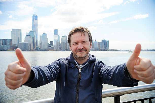 istock Happy man giving thumbs up sign 626346768