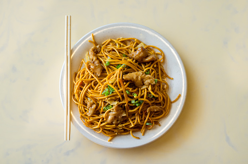 Chinese food tasty chicken lo mein noodles at restaurant