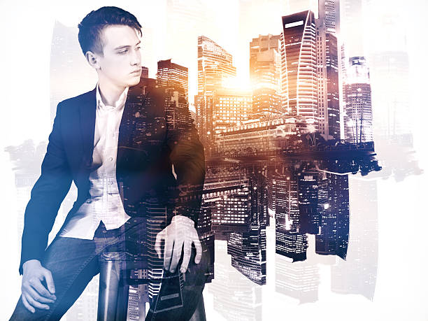 istock Stylish businessman on city background 626351116