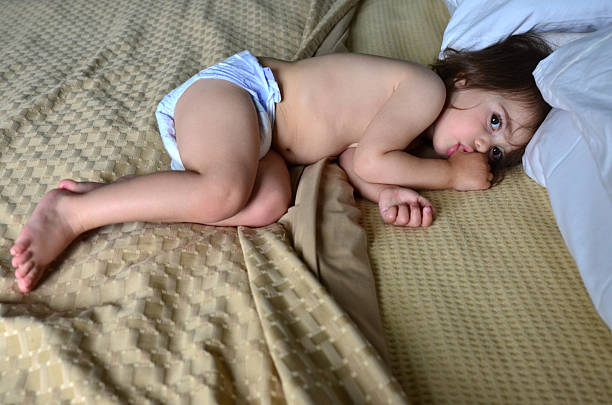 istock Baby Childhood - Thumb sucking 626351332