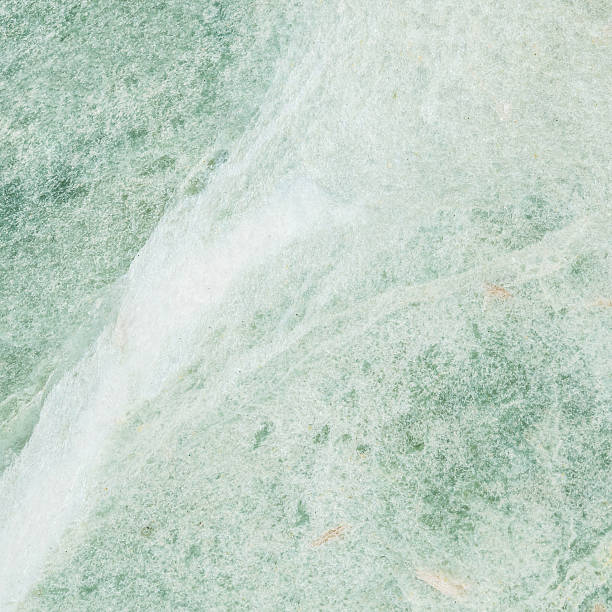 istock Closeup surface abstract green marble stone texture background 626368160