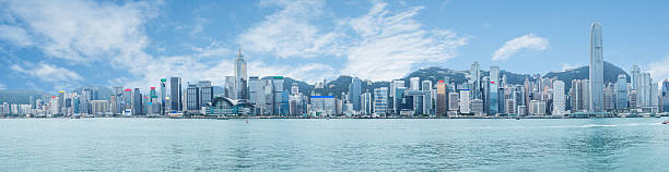 panoramic view of victoria harbor in Hong Kong stock photo