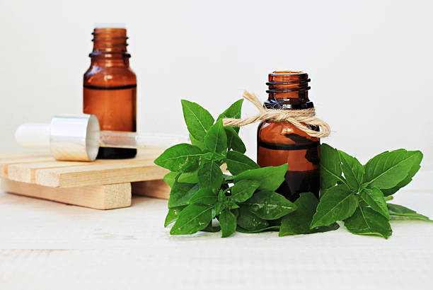istock Set of glass bottles Basil herbal tincture, essenatial oils 626374308