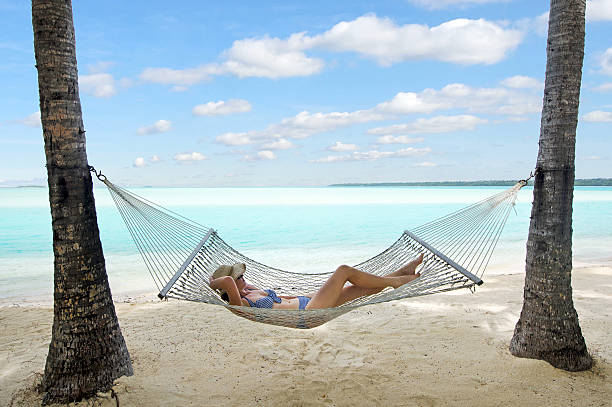 istock Woman relax during travel vacation on tropical island 626374776