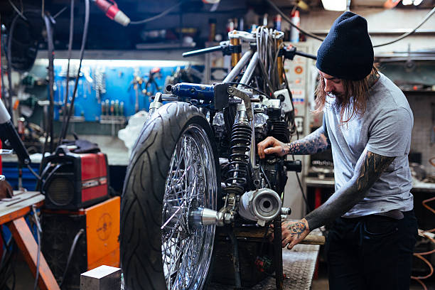 istock Repairman in garage 626375292