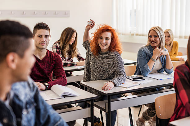 istock Happy high school students having fun in the classroom. 626385036