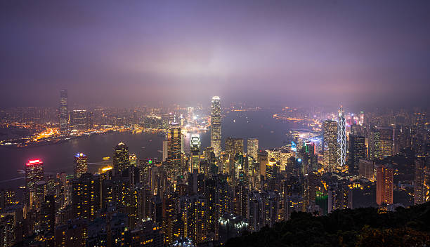 istock illuminated financial district in Hong Kong 626385892
