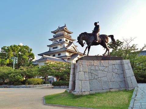 Ehime, Japan - July 20, 2016: Statue of Todo Takatora in front of Imabari castle in Imabari, Ehime Prefecture, Japan.