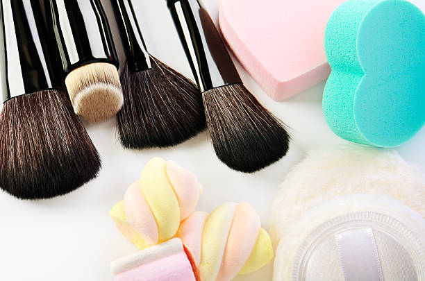 istock Makeup brushes, sponges heart shape,  powder puff and tree candi 626394924