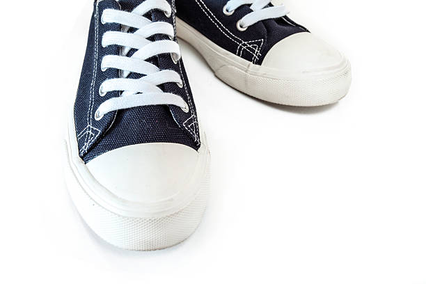 istock New blue sneakers on white background 626395234