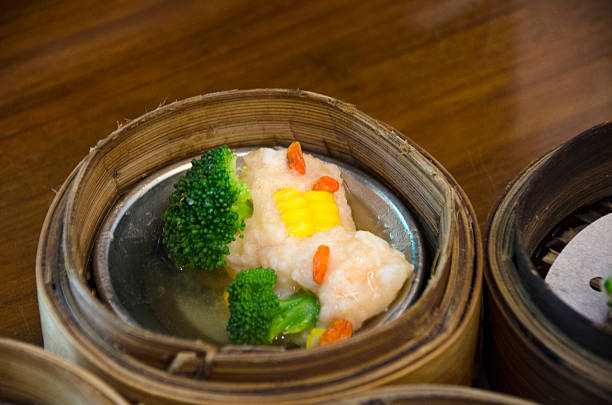 istock Dimsum in bamboo containers with soy sauce 626395542