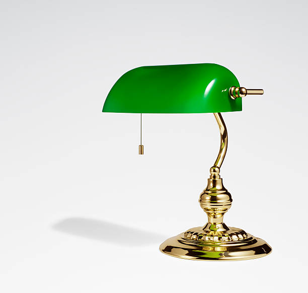 istock Proflie view of desk lamp on white background 626395570