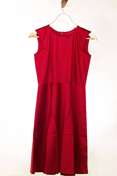 istock modern style red dress on hanger isolated on white 626396092