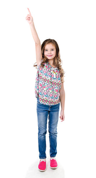istock Cute little girl is pointing up isolated 626397290