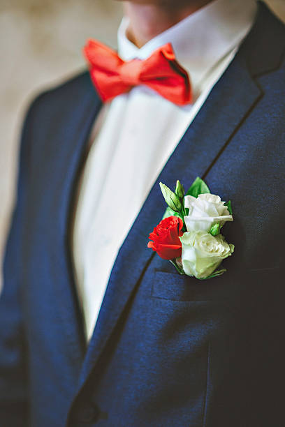 istock Photo  black suit with blue shirt  red, blue patterned tie 626397816