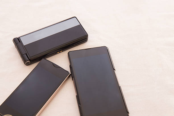 istock Two Smart phones, One Handyphone 626408240