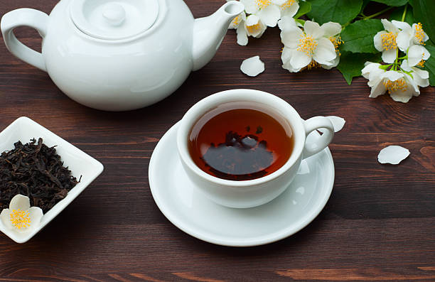 istock Hot black tea in a cup and saucer 626409072