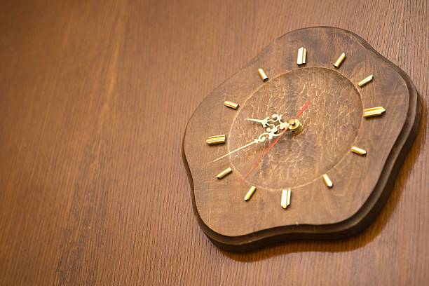 istock Wooden clock wooden top 626411420