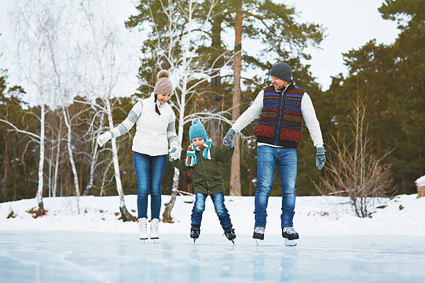 istock Cheerful family skating in park 626411714