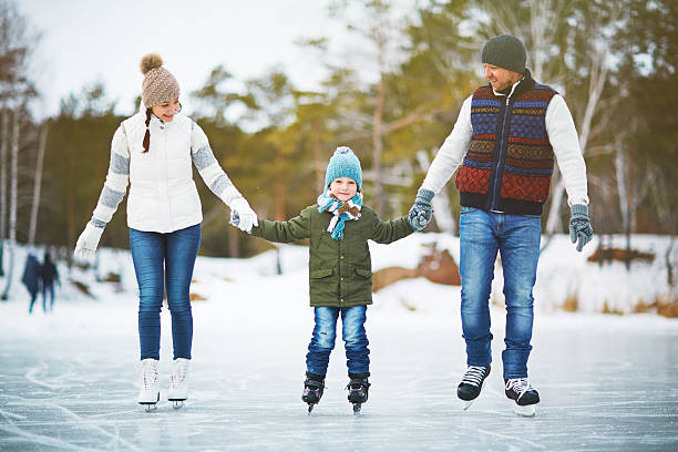 istock Joyful family of skaters 626411720
