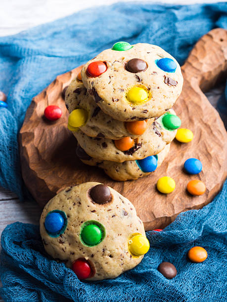 istock Chocolate chip cookies with colorful candies. Vertical 626412166