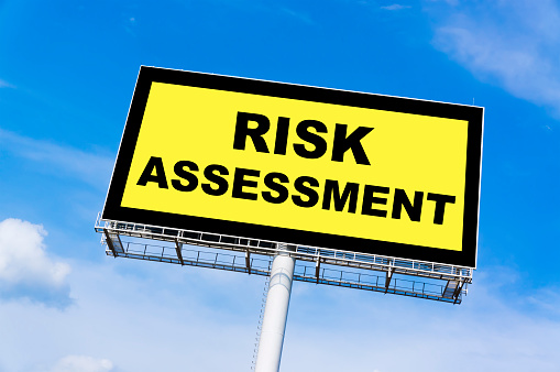 Risk Assessment Sign Billboard Stock Photo - Download Image Now