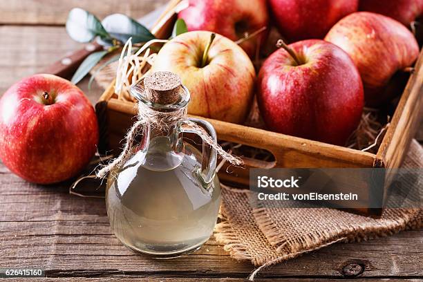 Bottle Of Unfiltered Apple Cider Vinegar Stock Photo - Download Image Now - Apple Cider Vinegar, Fruit, Vinegar