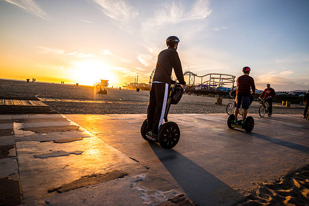 Santa Monica, USA  - January 24, 2016: People on Segway, Santa Monica Beach, CA, USA