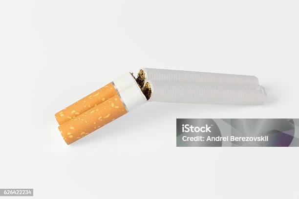 Two Cigarettes In A Shotgun Stock Photo - Download Image Now - Addiction, Cancer Cell, Cigarette